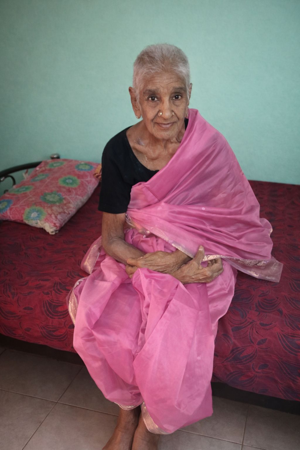 Senior gentleman participating in daily recreational activities with fellow residents