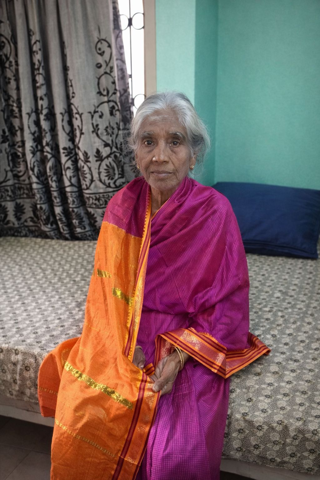 Friendly staff member engaging in conversation with happy resident